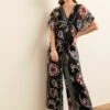 Next BATWING STANDARD - Jumpsuit - Navy Blue Sparkle Floral